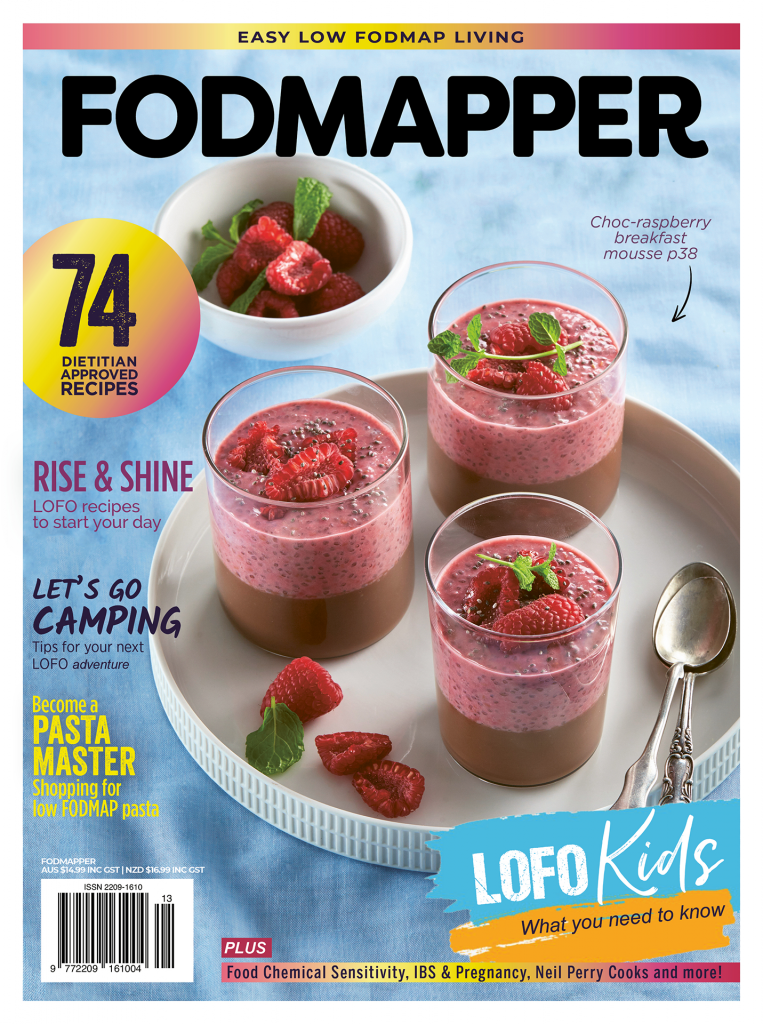 Cover of Issue 13of FODMAPPER magazine feature three choc raspberry breakfast puddings on a white tray with spoons and fresh raspberries.
